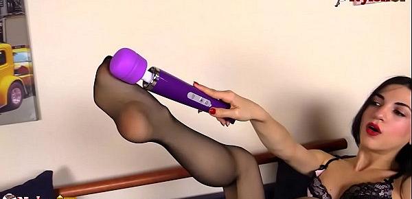  Brunette in pantyhose masturbating with her vibrator